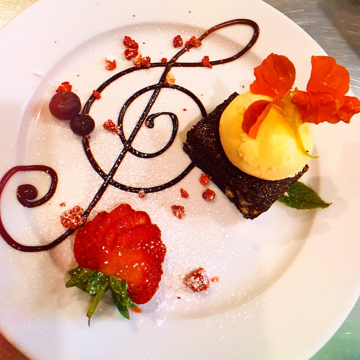 Chocolate brownie with ice cream served at ThewitchEZ